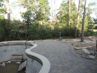 Woodlands Texas Pool Decking IPC Brick Pavers Concrete Sealer Landscaping Fire Pit