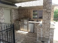 League City, Texas outdoor kitchen, Brick Paver Patio, Retaining Wall, Drainage System